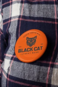 mockup of a round pin on flannel